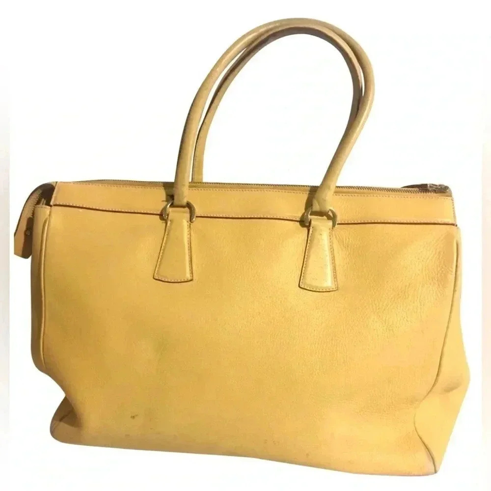 Salvatore Ferragamo yellow/ beige leather satchel handbag